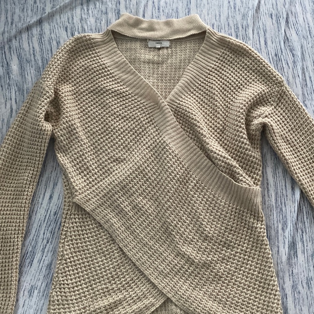 Cream knit wrap sweater with a choker neck